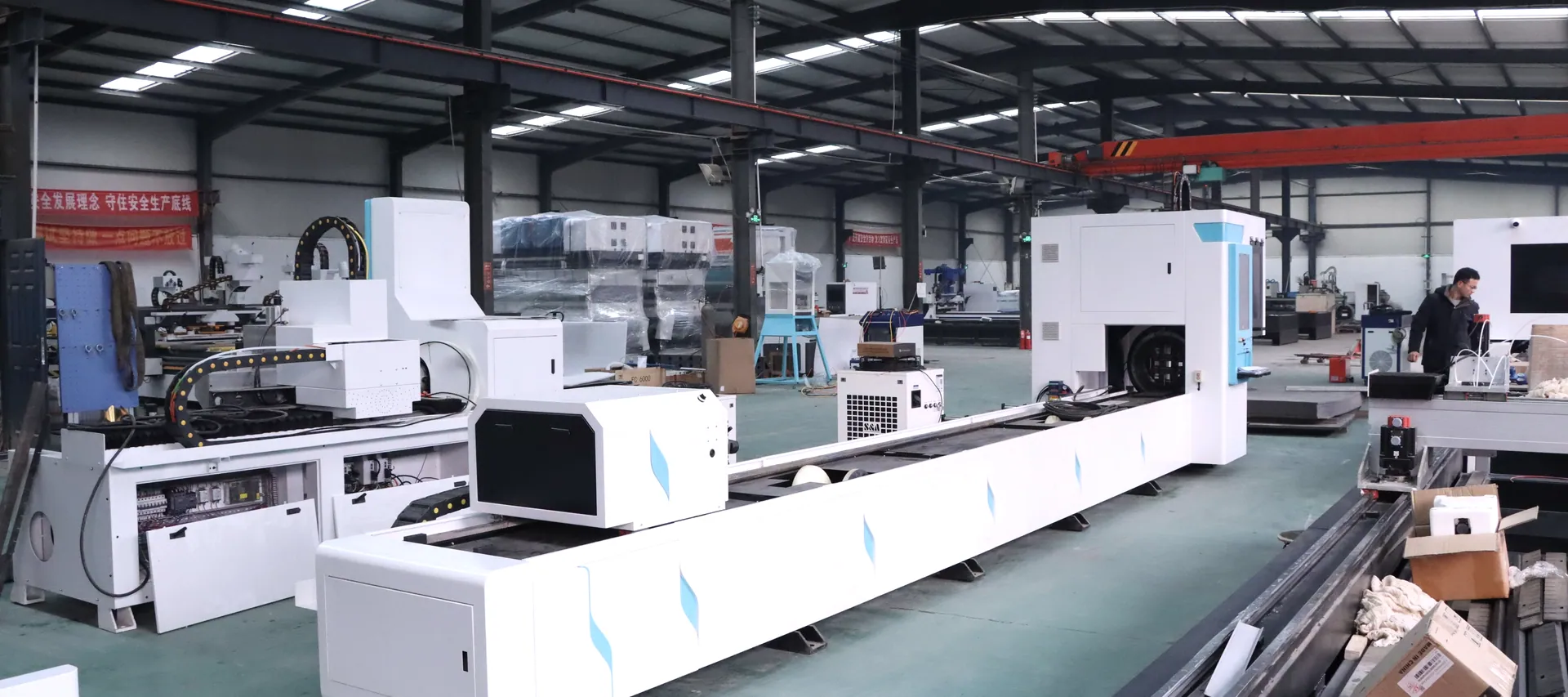 CNC machines operating across a modern manufacturing floor